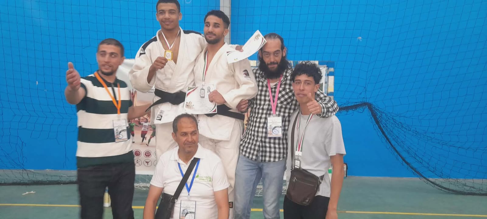 Ben Attia Ahmed from the Faculty of Humanities, after winning the silver medal in the final in Algeria in the weight category (-67) kg, specializing in the sport of judo.