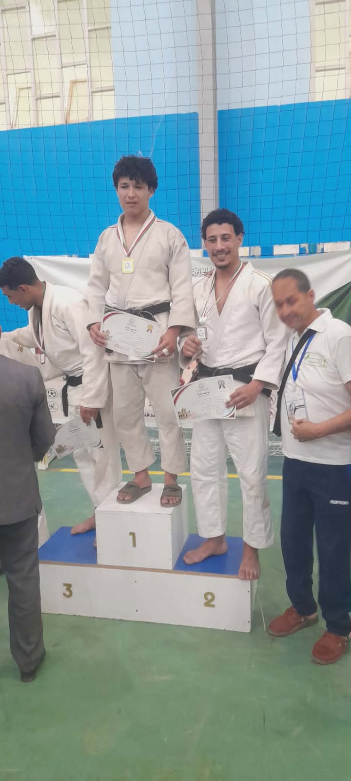 Ben Attia Ahmed from the Faculty of Humanities, after winning the silver medal in the final in Algeria in the weight category (-67) kg, specializing in the sport of judo.